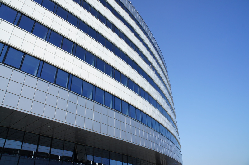 city, skyscraper, glass, Minsk, Architecture, no people, day, building exterior, blue, contemporary, sky, sunlight, pattern, outdoors, business, urban
