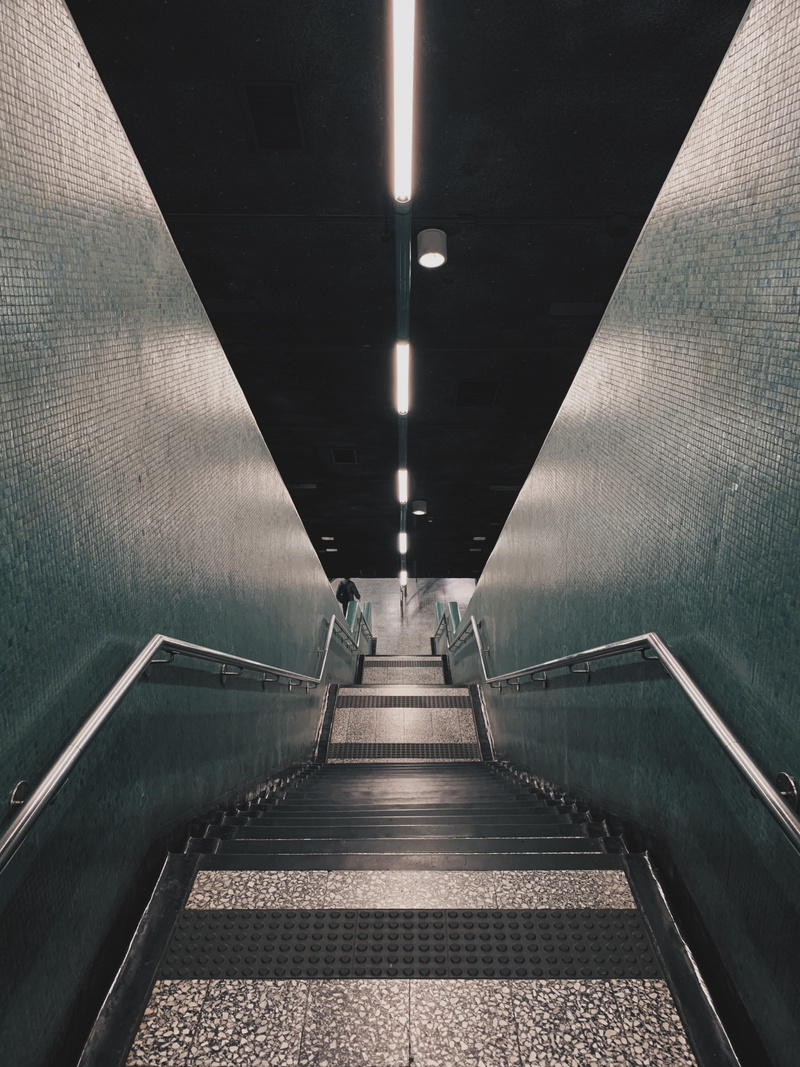 absence, corridor, indoors, pottery, concrete, plant, staircase, public transportation, underpass, bonsai, human, jar, road, person, transportation, no people