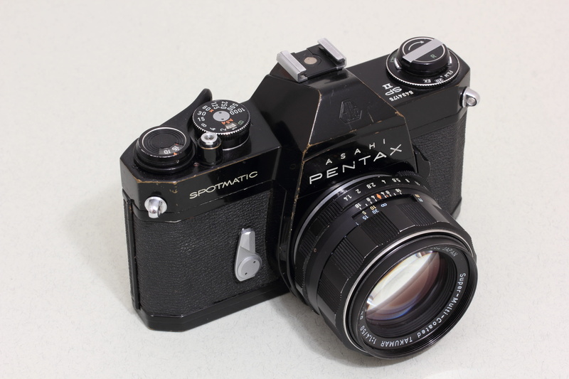 photographic equipment, slr camera, pentax, optical, slr, studio shot, white background, lens - eye, analog camera, 35mm, high angle view, indoors, spotmatic