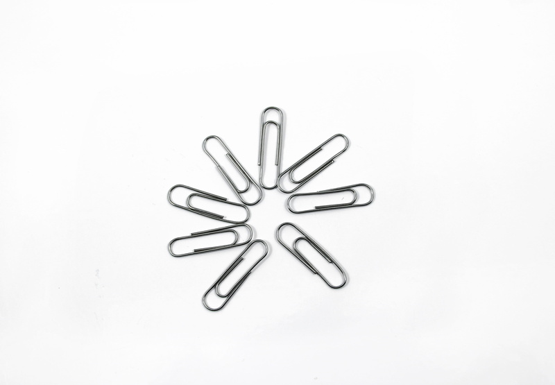white background, shape, image, white color, no people, indoors, white, Paper, simplicity, arrangement, close-up, paper clip, trombone paper, office supply
