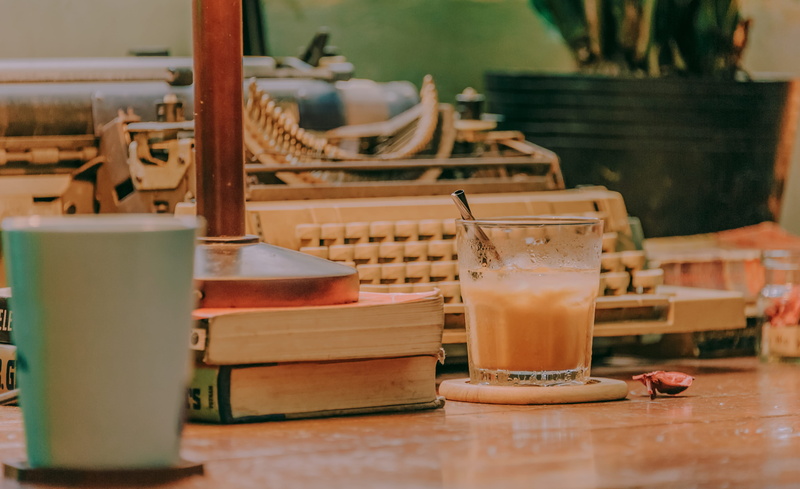 room, drinking glass, day, wooden, typewriter, still life, indoors, freshness, relaxation, glass, container, food and drink, vintage typewriter, close-up