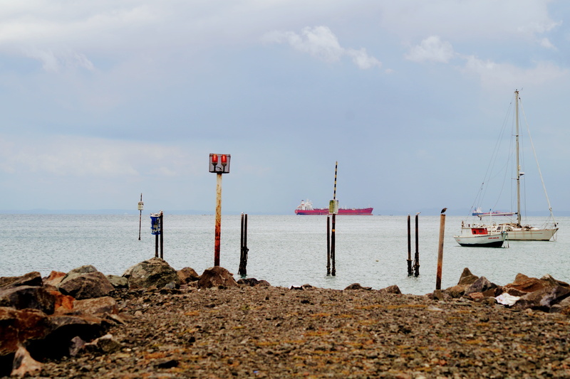 pole, no people, ship, day, sailboat, land, landing stage, tranquility, scenics - nature, rock - object, ocean, harbor, solid, sea, tanker, port, guiding lights