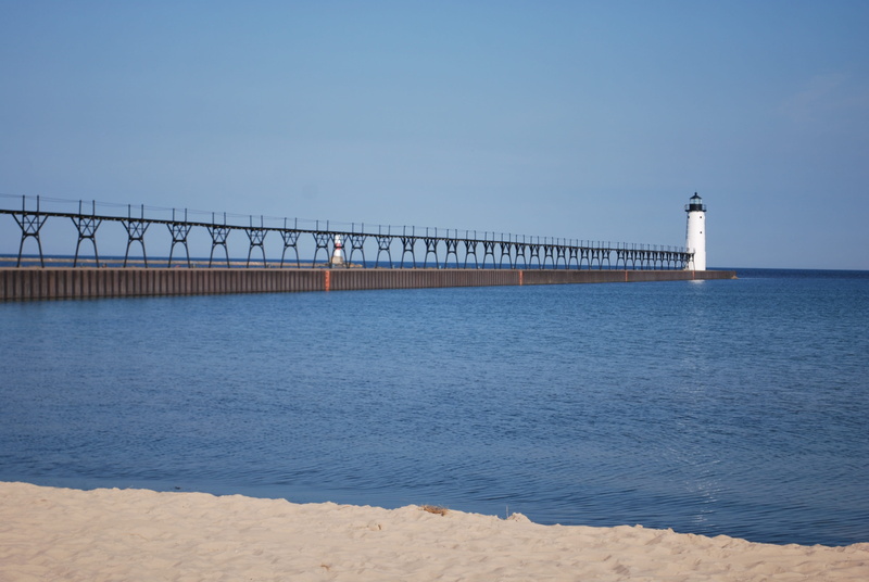 beach, outdoors, no people, lake, protection, land, tower, horizon over water, building, safety, building exterior, shore, architecture, guidance, built structure