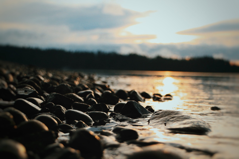 perspective, cloud - sky, tranquility, selective focus, landscape, sunlit, idyllic, pebble, rock - object, non-urban scene, no people, nature, wet, nautre