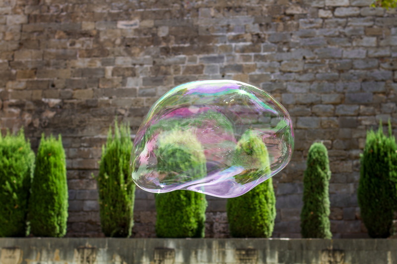 brick wall, iridescent, day, 5K, colorful, outdoors, no people, shimmer, close-up, freshness, fly, nature, bubble, mid-air, soap bubble, built structure