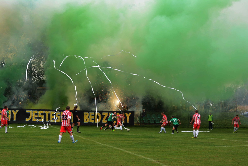 people, storm, athlete, power in nature, real people, binding, grass, 2K, soccer team, sky, nature, sport, lightning, derby, standing, crowd, outdoors