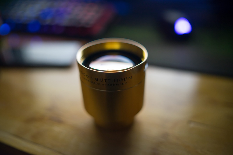 alcohol, light, bottle, still life, table, cinema, beer, food and drink, lens, close-up, high angle view, brown, gold, surface, cinematic, indoors, focus on foreground