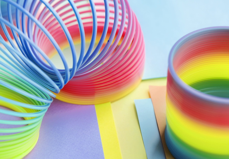 kids, motion, spiral, toys, childhood, focus, play, choice, selective focus, ring, pattern, spring toy, funky, color swatch, bright, flexible, closeup