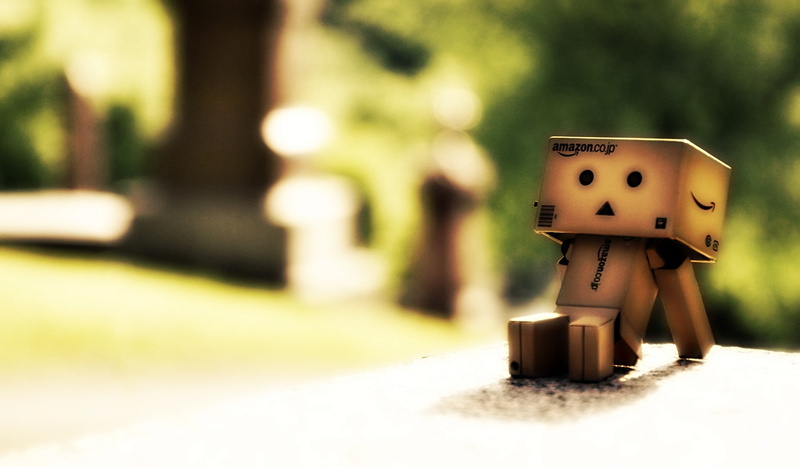 no people, poster, technology, grass, focus on foreground, park - man made space, sunlight, Danbo, close-up, human representation, nature, art and craft