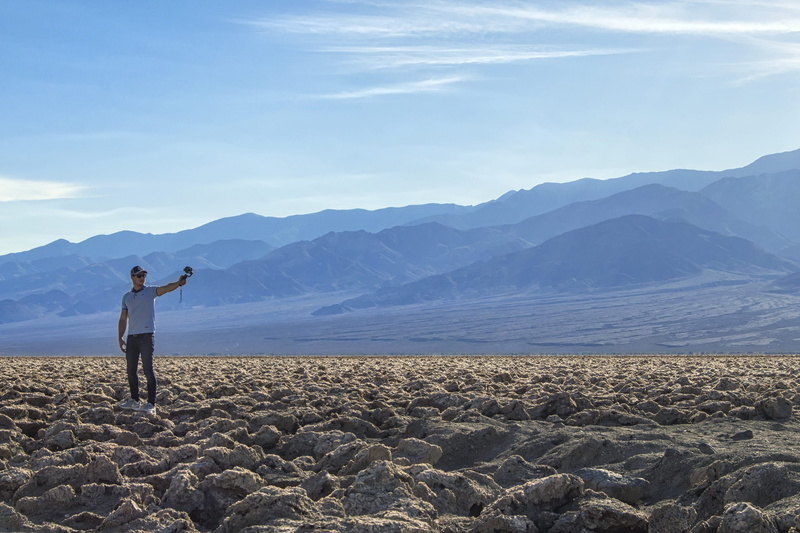 sky, united states, one person, mountains, real people, man, non-urban scene, tranquil scene, mountain, selfie, men, full length, outdoors, environment