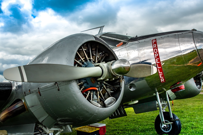 sky, airport, travel, the past, air vehicle, classic, no people, old, nature, metal, retro styled, plane, outdoors, antique, silver colored, architecture
