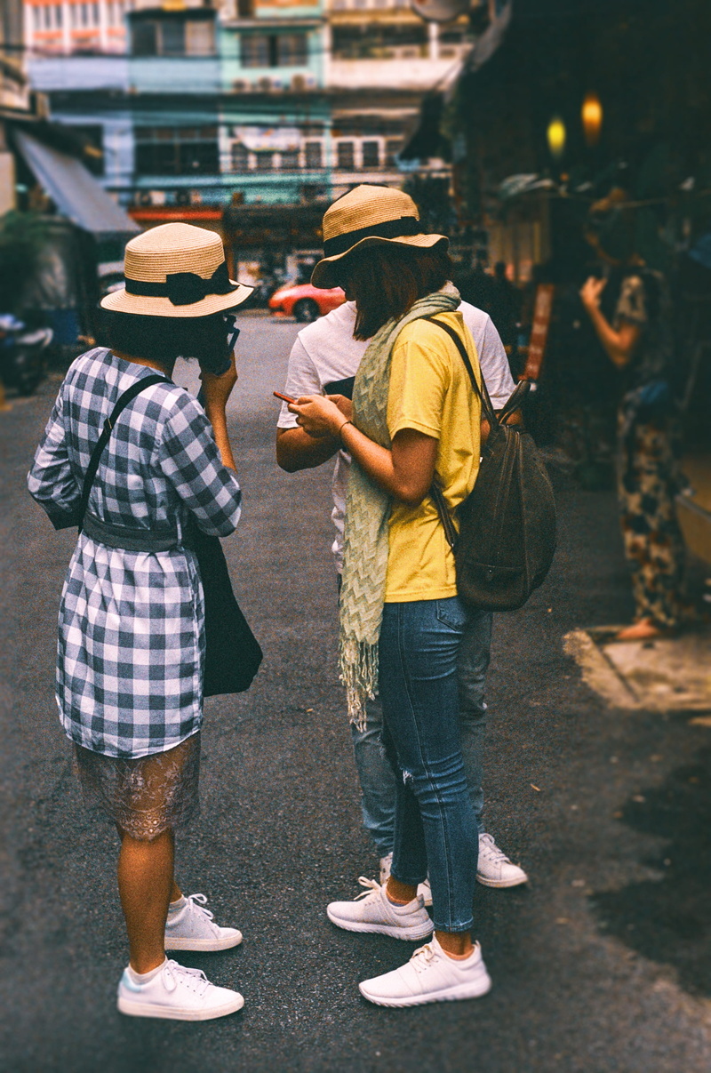 phone, building, hat, holiday, urban, technology, 2K, khaosan road, adult, casual clothing, men, standing, wearing, women, tech, architecture, good day