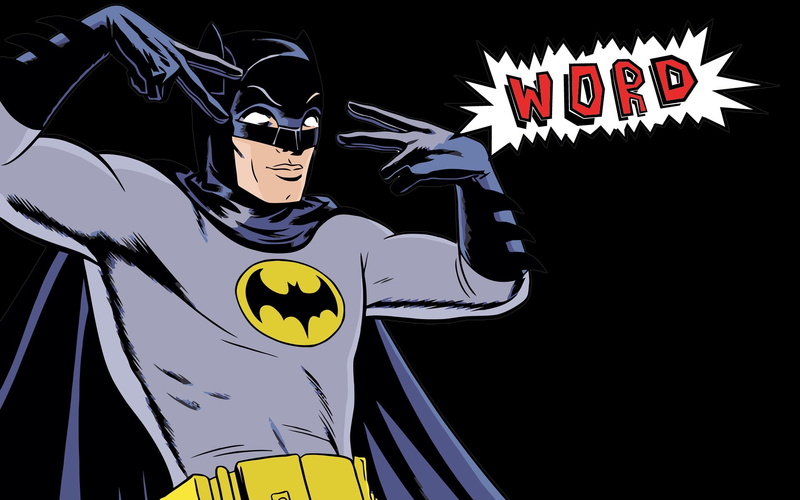 yellow, cartoon, human representation, communication, script, leisure activity, information sign, representation, Batman, capital letter, non-western script