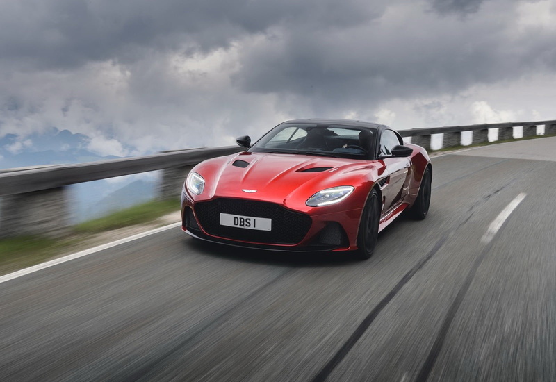 sky, motor vehicle, aston, martin, sports car, sign, superleggera, nature, wheel, road, motion, luxury, day, on the move, mode of transportation, dbs, (2019)