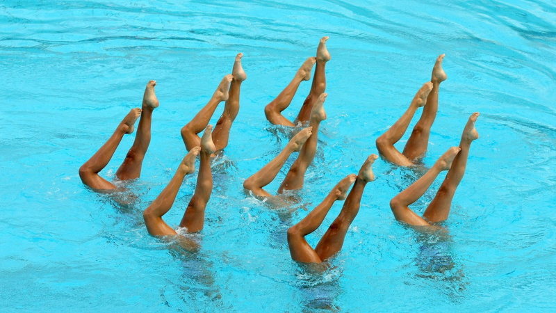 blue, high angle view, healthy lifestyle, day, swimming, cooperation, cyan, child, people, teenage girls, human body part, skill, nature, legs, water, exercising