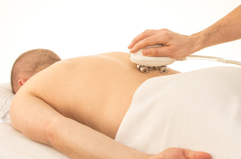 studio shot, healthcare and medicine, s, people, back, person, only women, human body part, human hand, indoors, palm, Relaxation, well being, hand, massager