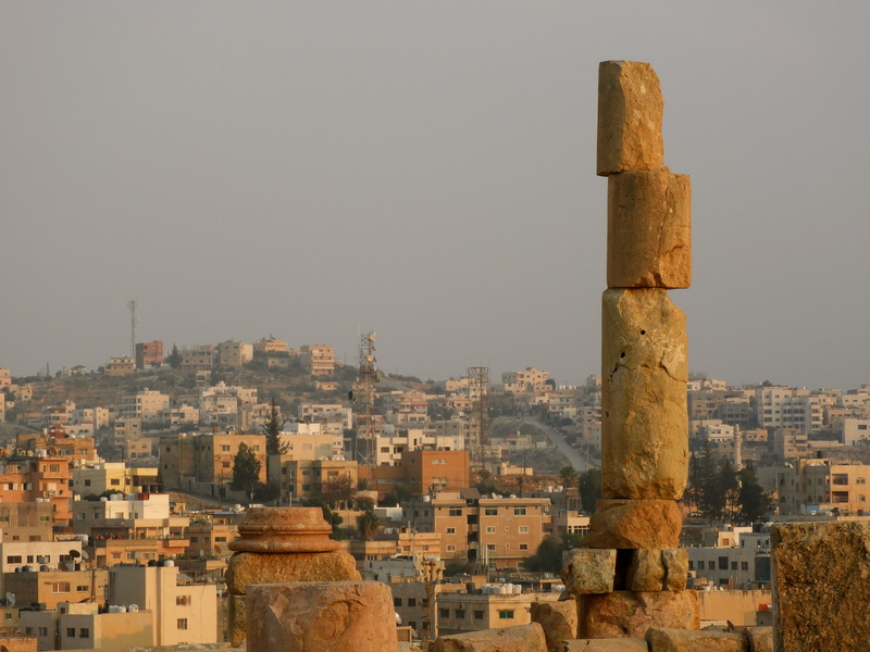 architectural column, travel, ancient, residential district, old, city, no people, built structure, jordan, site, landmark, outdoors, column, sky, cityscape