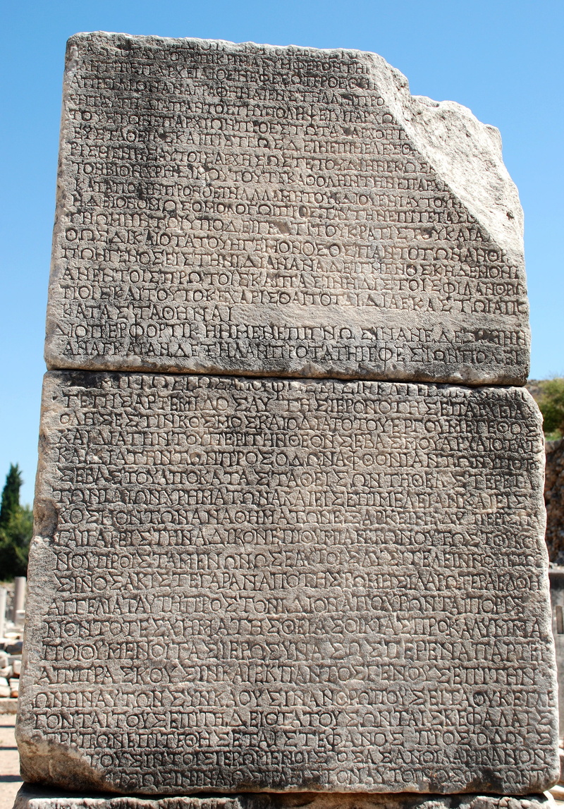 low angle view, writing, history, travel, text, recorded, built structure, old, nature, outdoors, ephesus, solid, day, architecture, sky, stone, memorial