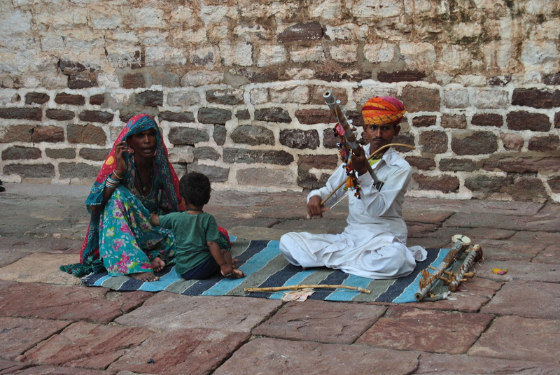 females, full length, wall - building feature, sister, brick, child, leisure activity, india rajastan indianfamily, clothing, adult, women, day, architecture