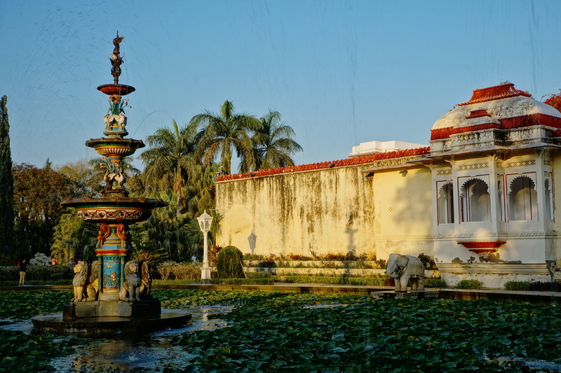 travel destinations, hinduism, religion, sculpture, water, spirituality, plant, fountain, day, building, architecture, udaipur, clear sky, 5K, travel