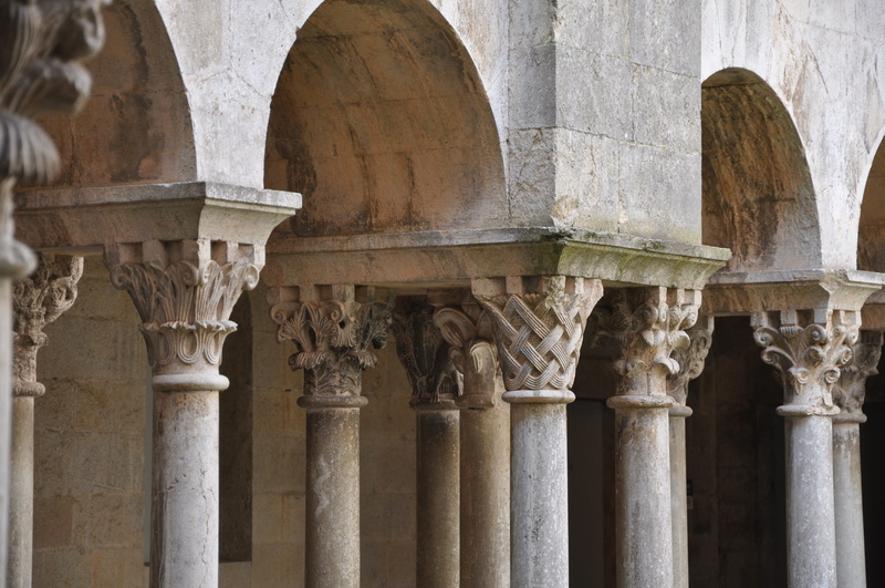 travel, building exterior, travel destinations, stone material, architectural column, old, arcade, arch, low angle view, built structure, day, no people