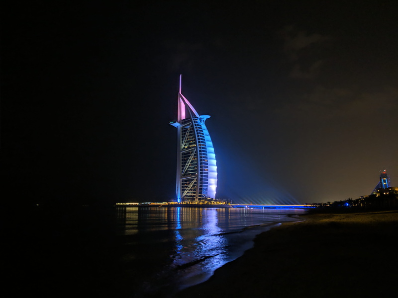 uae, building, travel destinations, illuminated, burj al arab, tower, outdoors, building exterior, urban, nature, steeple, waterfront, control tower, water