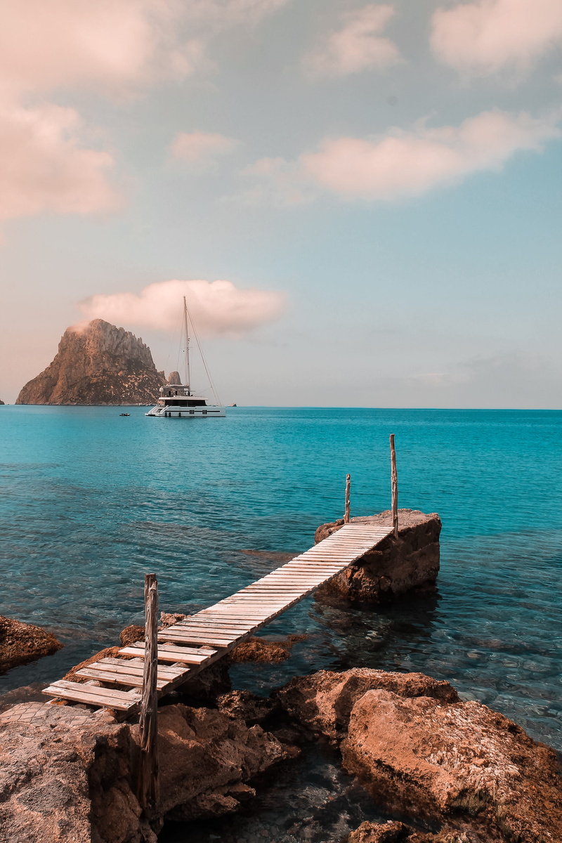 transportation, beauty in nature, cloud - sky, scenics - nature, spain, tranquility, sailboat, land, tranquil scene, water, rock - object, outdoors, sky