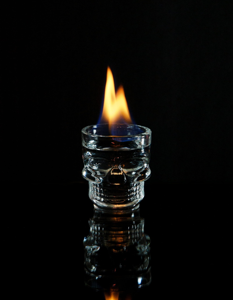 Flame, Vodka, heat - temperature, burns, orange color, death, glass - material, studio shot, Drink, copy space, Skull, illuminated, glowing, Alcohol, black