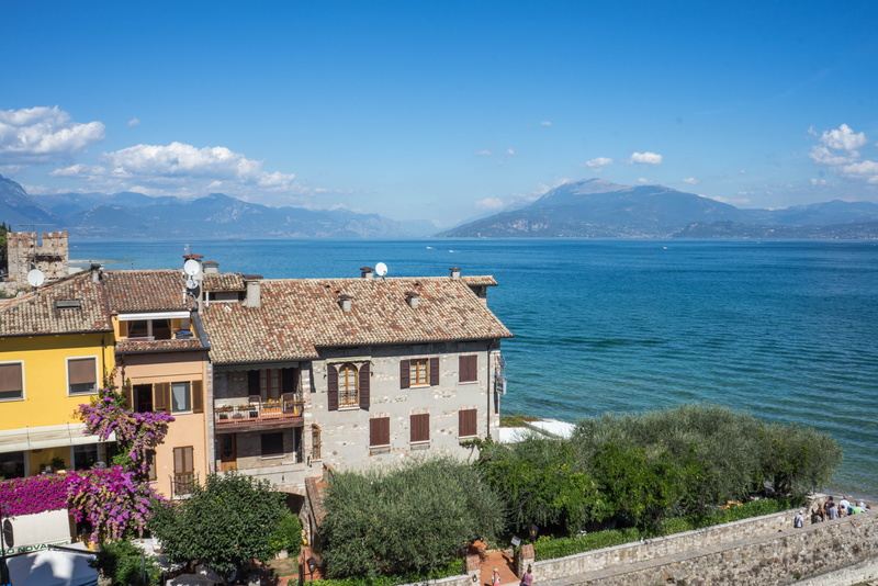 travel, flowers, sky, mountains, view, tourism, old, cloud - sky, 5K, building, outdoors, beauty in nature, sirmione, sea, italy, lake garda, medieval