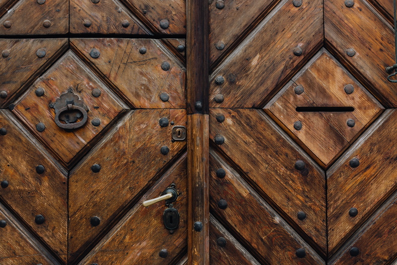 door, full frame, design, safety, ornate, security, backgrounds, entrance, doors, wood grain, sculpted, metal, indoors, wood, no people, vintage, antique