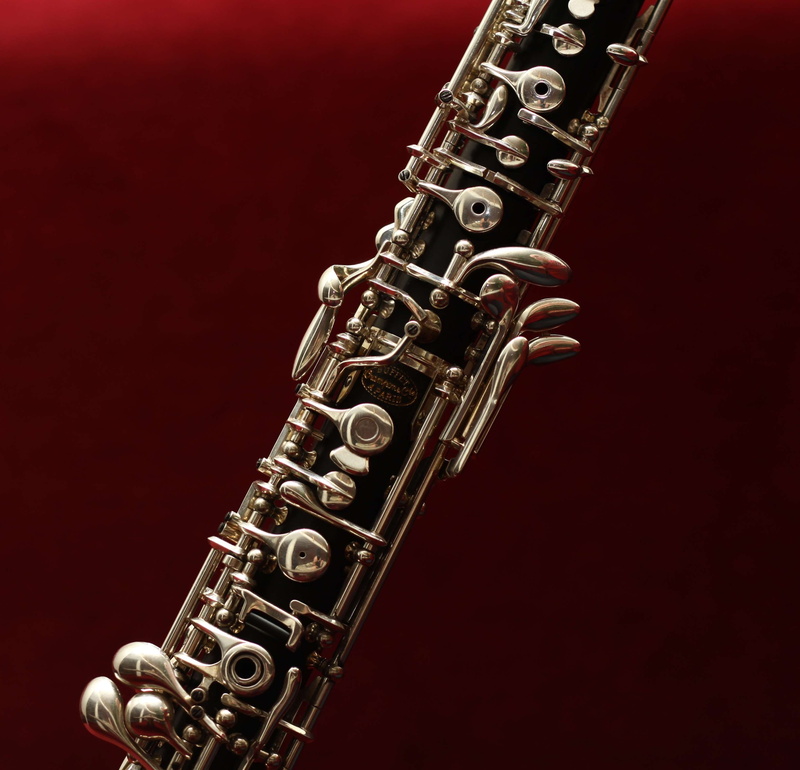 2K, metal, brass instrument, performance, instument, saxophone, tubular, indoors, black background, intricate, musical equipment, brass, no people, silver colored