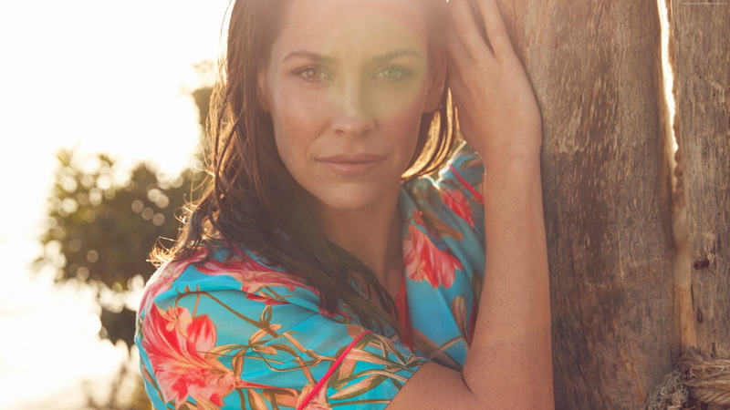 brunette, one person, hairstyle, human face, young adult, casual clothing, outdoors, actress, beautiful woman, floral pattern, young women, portrait, looking at camera