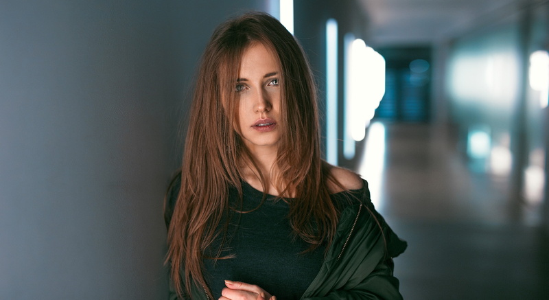 jacket, sweater, hair in face, looking at viewer, hallway, women, brunette, women indoors, Alexey Slesarev, model, depth of field, 2K, portrait