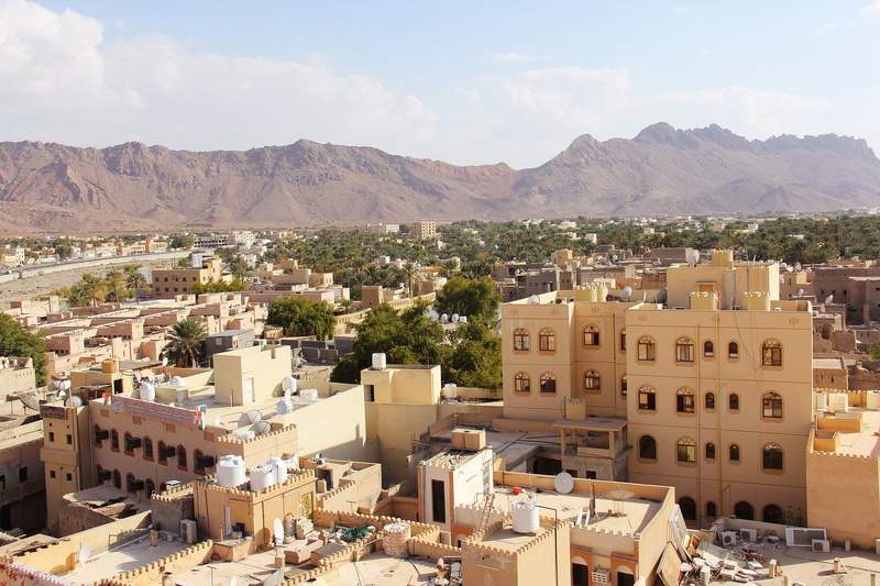 building exterior, apartment, hill, nizwa, old town, day, architecture, beautiful, townscape, cloud - sky, scenic, sunlight, mountain, scenery, cityscape