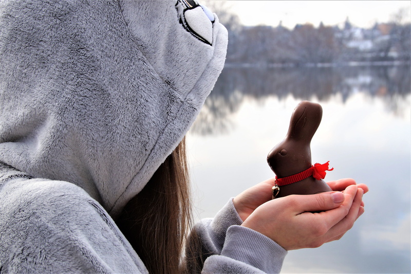 nature, midsection, holding, girl, water, the tradition of, lifestyles, lake, warms, plush coverall, easter, bunny girl, real people, day, hands, hood