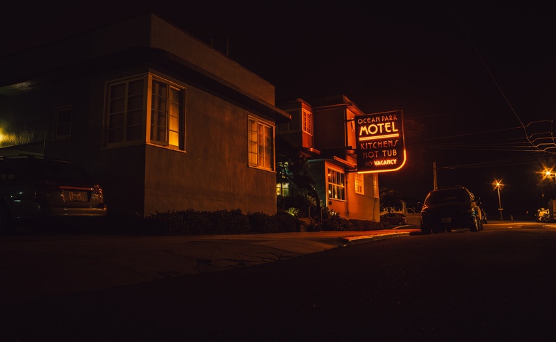 illuminated, street, sign, building, neon, architecture, night, car, western script, communication, park, nature, building exterior, motel, outdoors, beside