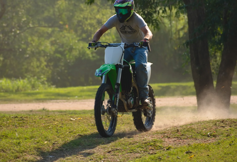 belize, full length, day, real people, field, nature, plant, ride, motocross, race, recreation sport, mode of transportation, lifestyles, kawasaki, riding