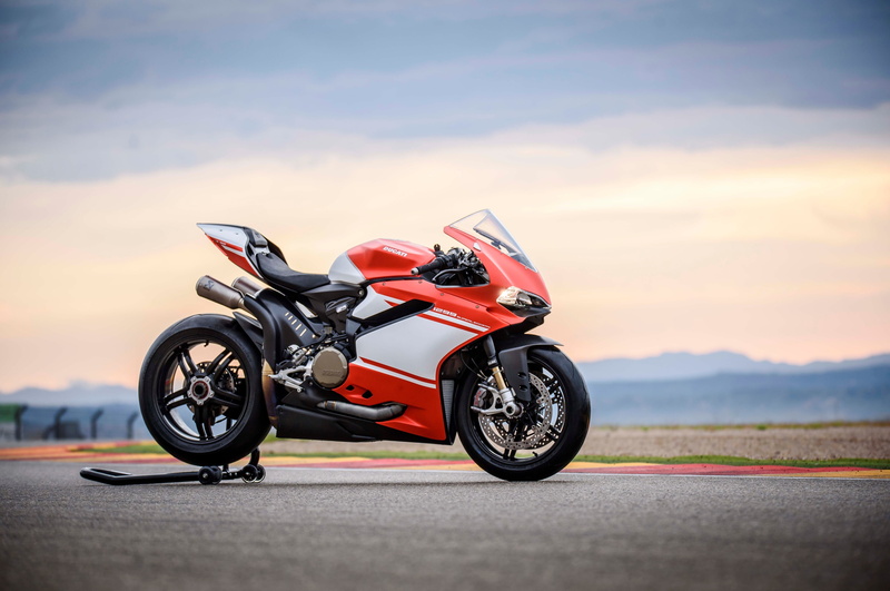 motorcycle, driving, sports equipment, riding, cloud - sky, biker, transportation, sports helmet, mode of transportation, one person, leather, land vehicle