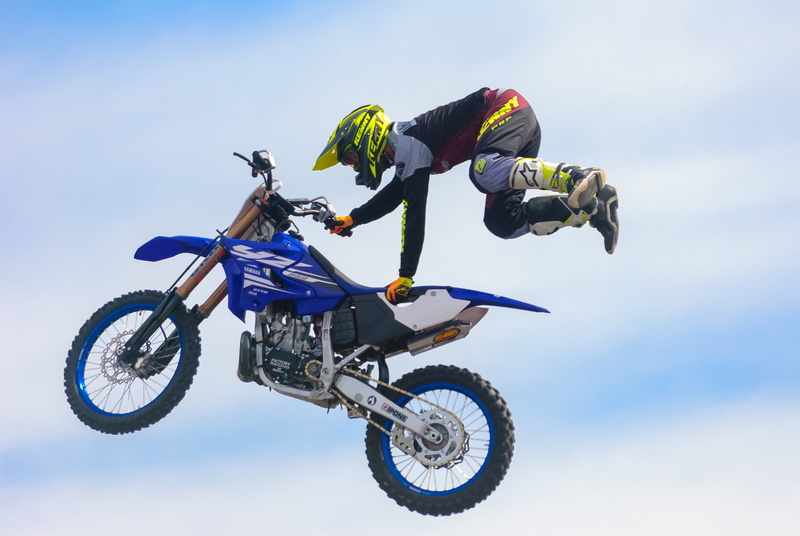 risk, sky, style, competition, skill, headwear, mode of transportation, motorcycle, cascade, rider, riding, freestyle, stuntman, transportation, sport
