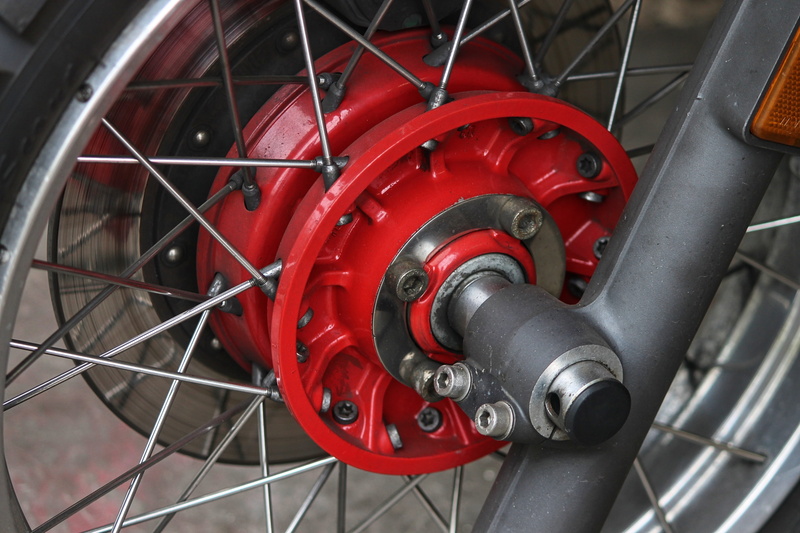 machine valve, industry, technology, brake, travel, bicycle, silver, front wheel, mature, red, motorcycle, valve, connection, transportation, spoke, close-up