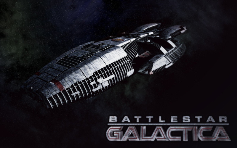 sign, night, communication, old, no people, black background, technology, indoors, studio shot, western script, battlestar galactica spaceship, dark, weapon