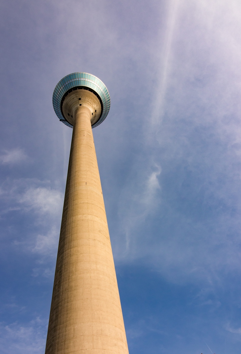 built structure, city, low angle view, tower, düsseldorf, communication, building exterior, day, blue, tall - high, landmark, travel destinations, tv tower