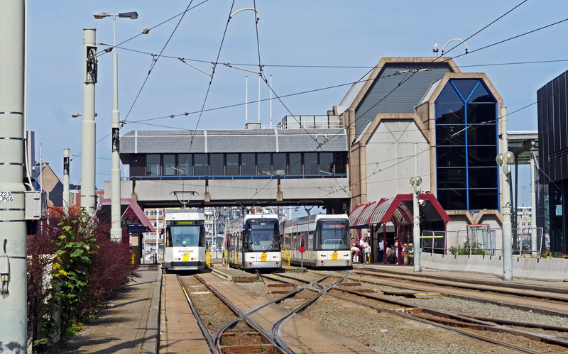 built structure, outdoors, building exterior, cable, hub, city, coast, transportation, harbour area, operation center, rail transportation, public transportation