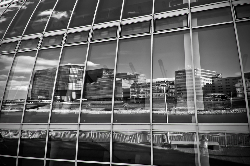 outdoors, full frame, office building exterior, transparent, building, glass front, city, glass - material, sky, no people, mirroring, nature, building exterior