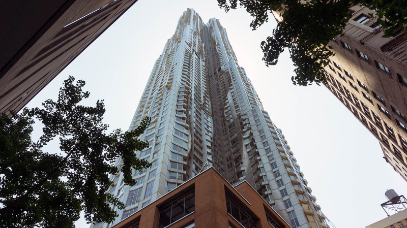 building, office, outdoors, tall - high, financial district, nature, clear sky, built structure, tree, frank gehry, day, nyc, apartment, new york, low angle view