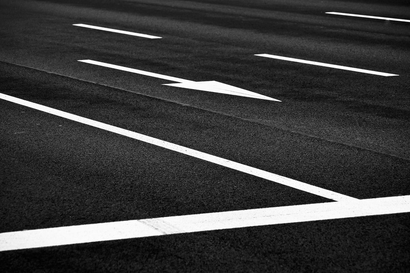 sign, black and white, traffic, architecture, rules, contrast, outdoors, high angle view, track mark, 4K, symbol, dividing line, communication, direction