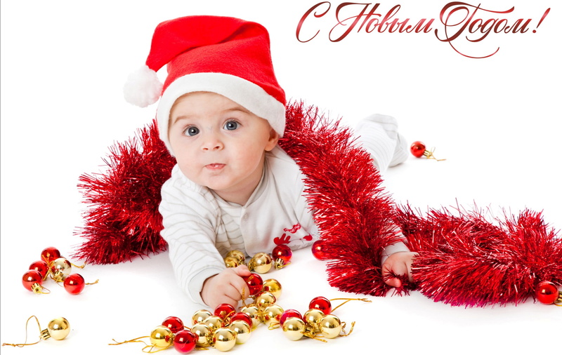celebration, red, indoors, holding, beautiful, front view, santa hat, young, innocence, christmas ornament, Baby, studio shot, christmas, child, white background