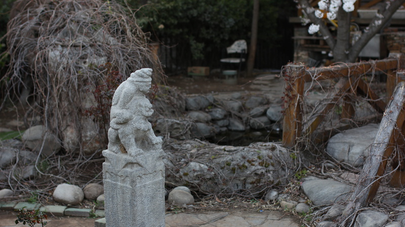 no people, day, focus on foreground, tree stump, lamp post, tomb, tombstone, ground, mud, vertebrate, 5K, wall, flagstone, human representation, stone wall