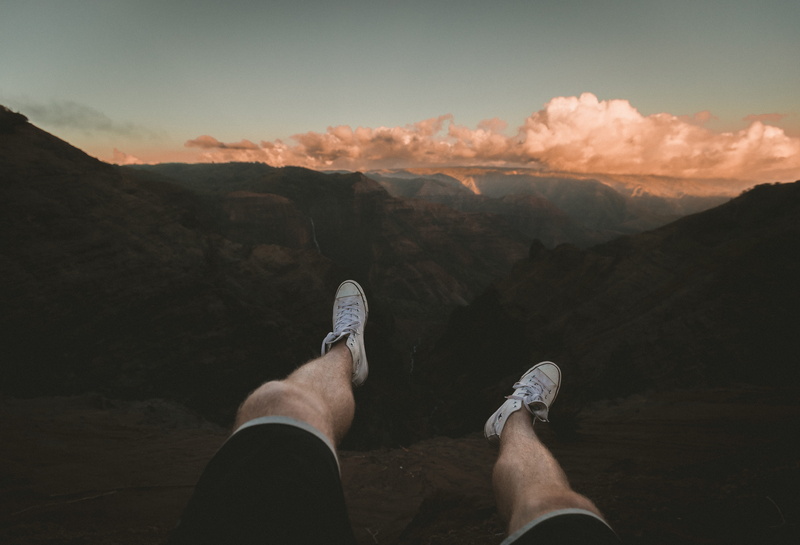 leisure activity, sitting, environment, outdoors, guy, men, cloud, human limb, rock, tops, nature, one man only, feet, person, land, 5K, cliff, white