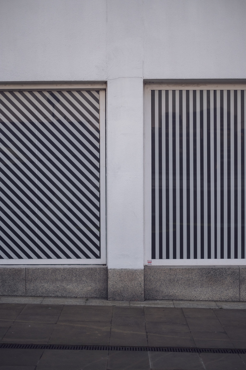 security, pattern, city, building exterior, flooring, protection, outdoors, white, painted, streetphotography, window shade, home decor, wall - building feature